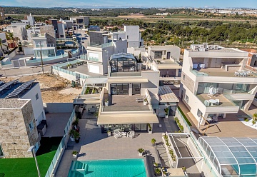 Luxe villa met zwembad en uitzicht op zee in Dehesa de Campoamor in Ole International