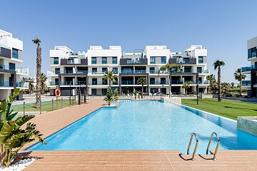 2- och 3-rumslägenheter med stora grönområden och pool i Guardamar in Ole International