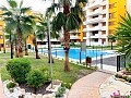 Apartamento de 2 dormitorios cerca del mar en Punta Prima in Ole International