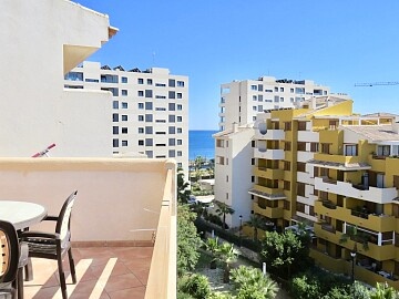 Atico de 2 dormitorios orientado al sur con vistas al mar en Punta Prima in Ole International