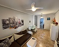 Apartamento en planta baja con 2 dormitorios en Punta Prima  in Ole International