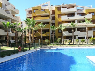 Apartament cu 3 camere în Punta Prima, lângă mare * in Ole International
