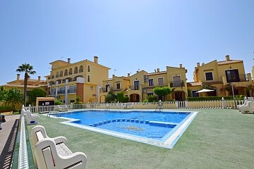 2 beds townhouse overlooking the pool in La Zenia  * in Ole International