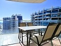 Apartamento de lujo de ALQUILER con 2 dormitorios frente al mar en Punta Prima * in Ole International